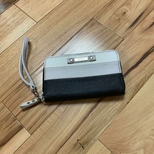 A Jessica Simpson wallet w/wrist strap